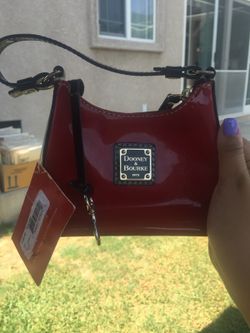 Red mini Dooney and Burke purse