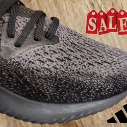 Adidas AlphaBOUNCE Beyond running shoes in a black and grey colorway