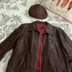 100% Leather, Jacket & Cap used good condition $90