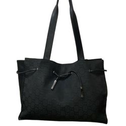 GUCCI GG Canvas Drawstring Shoulder Bag

Description
Gucci Shoulder Bag
Black
Silver-Tone Hardware
Calf Leather Trim
Dual Shoulder Straps
Logo Jacquar
