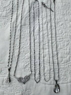 Necklaces different materials- stainless steel-stone- pearls