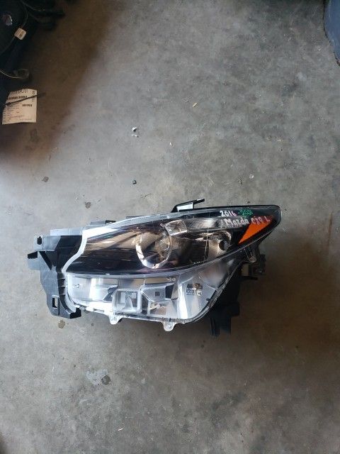 Mazda CX9 left headlight