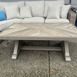 Signature Design by Ashley Beachcroft Outdoor Rectangular Porcelain Top Coffee Table