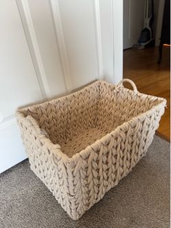 large, heavy basket on a metal frame