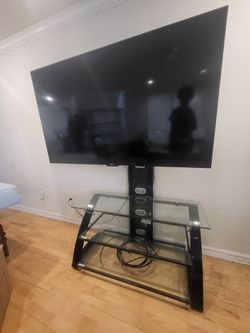 Sleek glass TV stand
