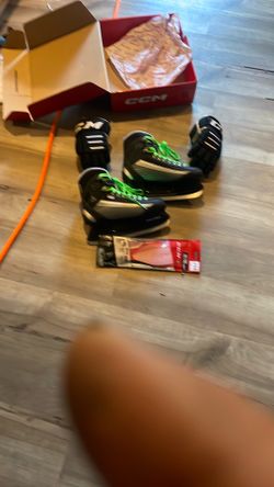 Ice skates and gloves for hockey