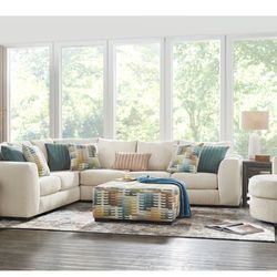 Beige two-piece sectional sofa from Rooms To Go