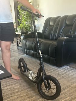 Adult Scooter  holds up to 330lb “never used”