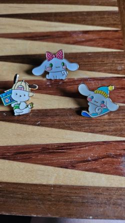 three  hello Kitty and Friends enamel pins
