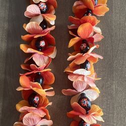 Orange Beaded Lei With Orange Flowers On Bead