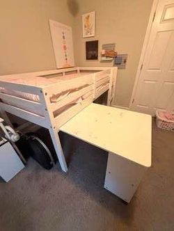 Bed with desk and book shelve