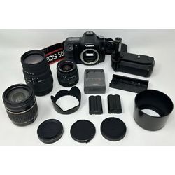 Canon EOS 50D DSLR Camera & 3 Lens Bundle