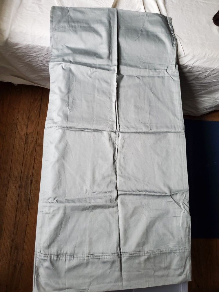 1Gray Calvin Klein Home 100% combed cotton  King pillowcase 19"*38" net weight 5.8oz 

The care instructions on the label state:
• 100% combed cotton
