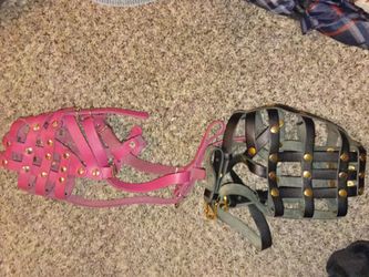 Two leather muzzles