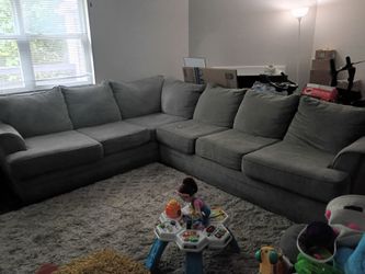 Large grey sectional couch