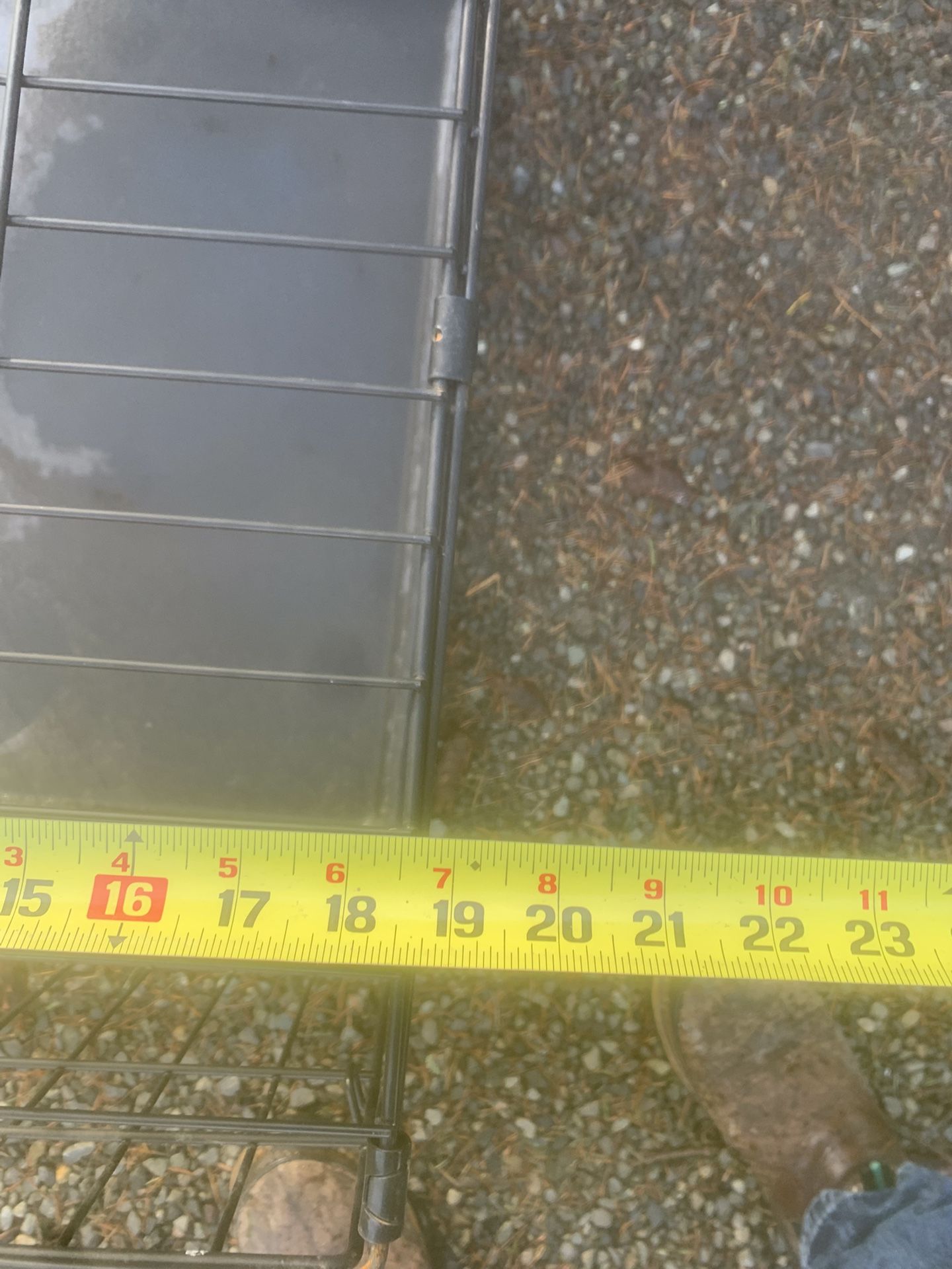 small dog crate has bottom liner