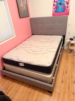 Upholstered full size bed with mattresses