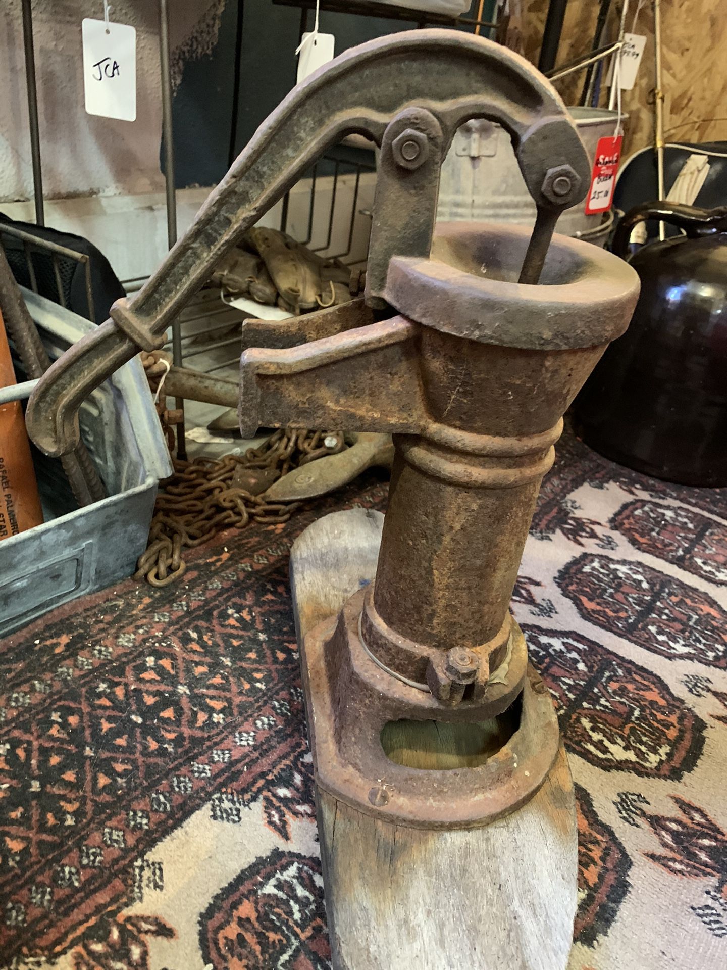 Antique vintage cast iron 1920s or older water pump. Authentic genuine. 99.00. 😀Johanna 212 north Main Street buda furniture collectibles vintage to