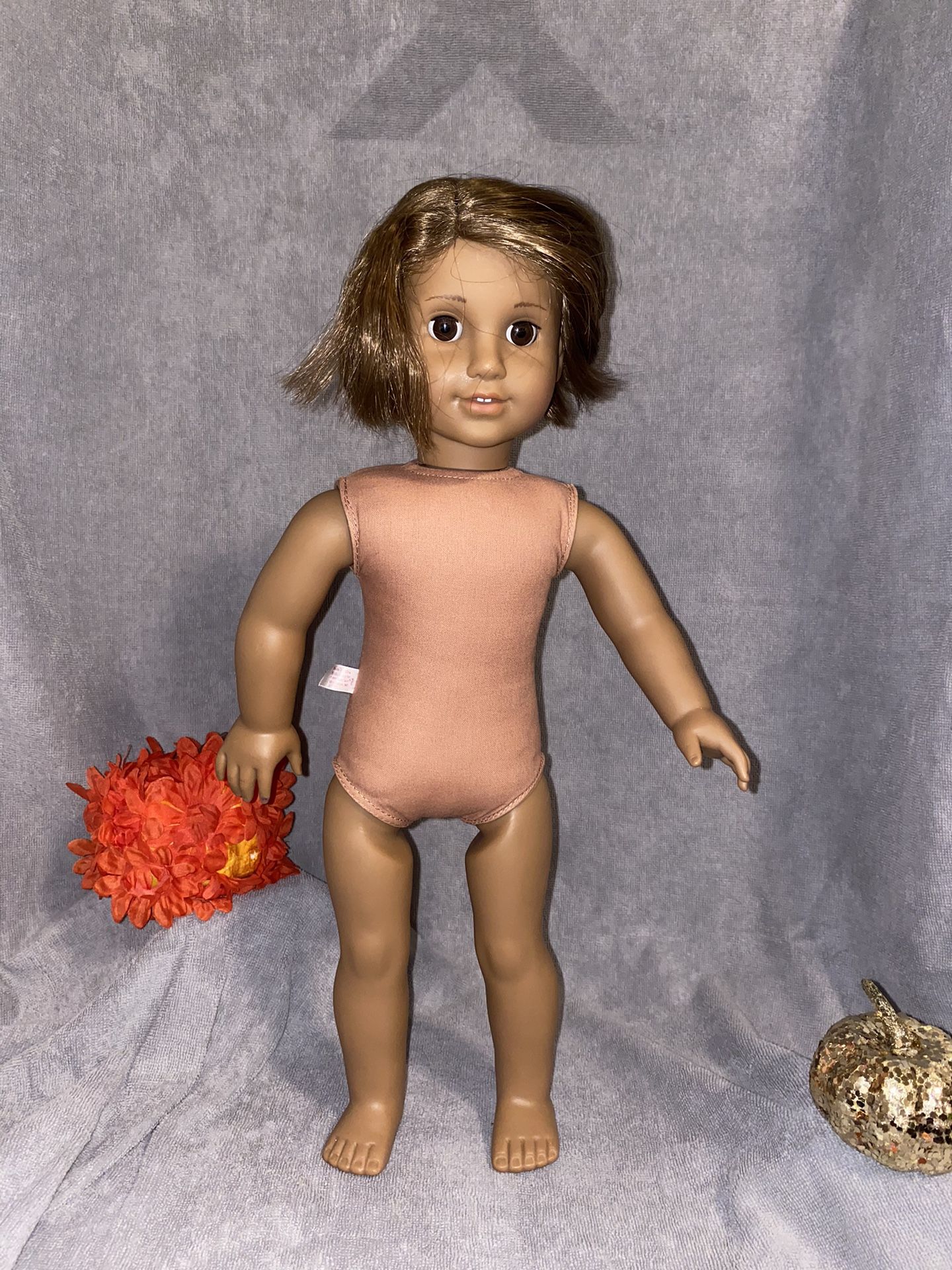 American Girl Marisol Luna with haircut and drawing on her face