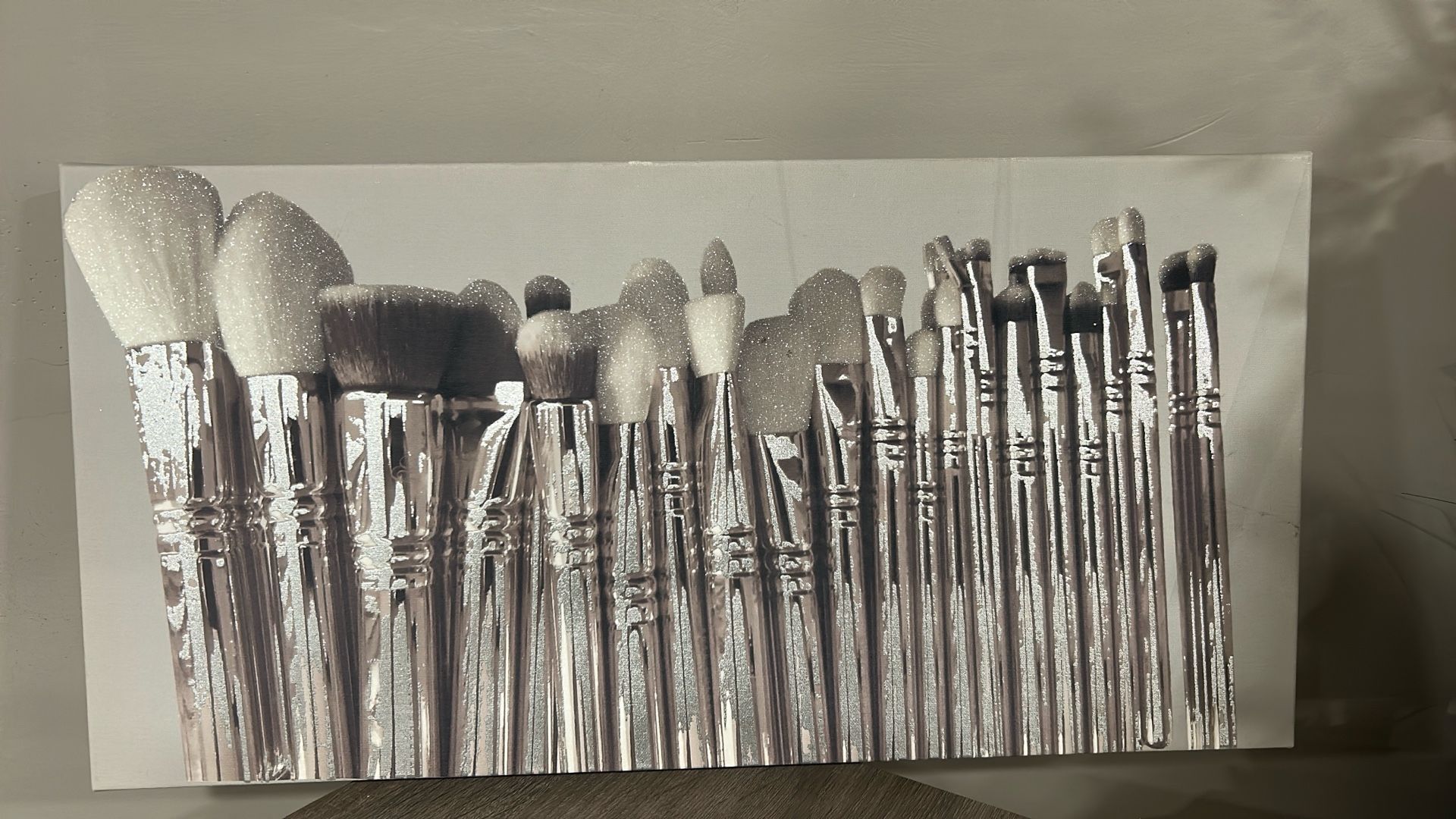 Sparkling Silver Makeup Brushes On Canvas