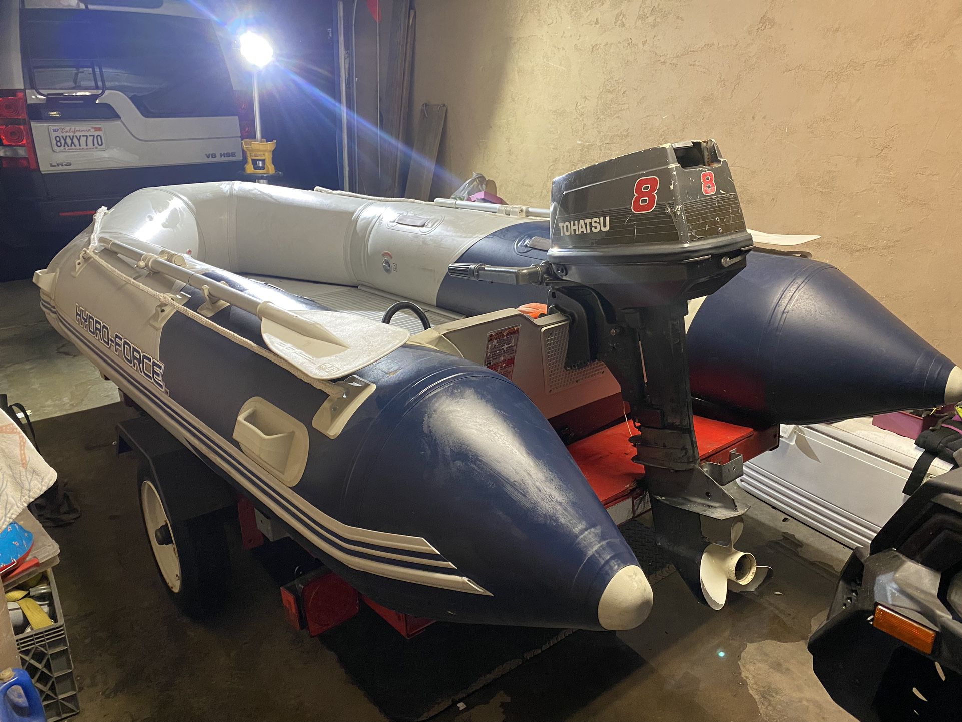 Inflatable With Outboard And Trailer Has Registration 