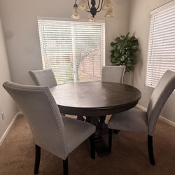 Round Dining Table And Chairs