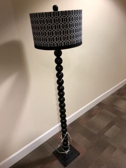 Excellent condition 5 foot wooden lamp.