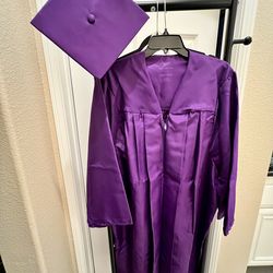 Vibrant purple Jostens BDG Collection graduation set.