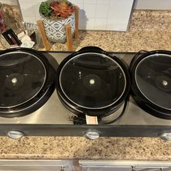 Two Triple Slow Cookers