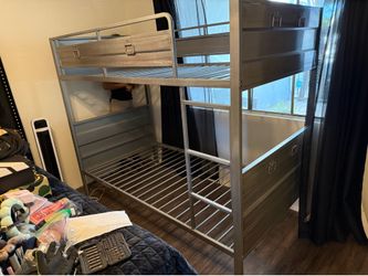 Twin size bunk beds silver metal.