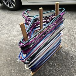 Plastic Clothes Hangers On A Storage Rack
