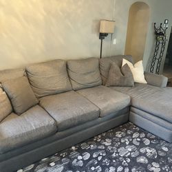 Living Spaces Grey Sectional couch