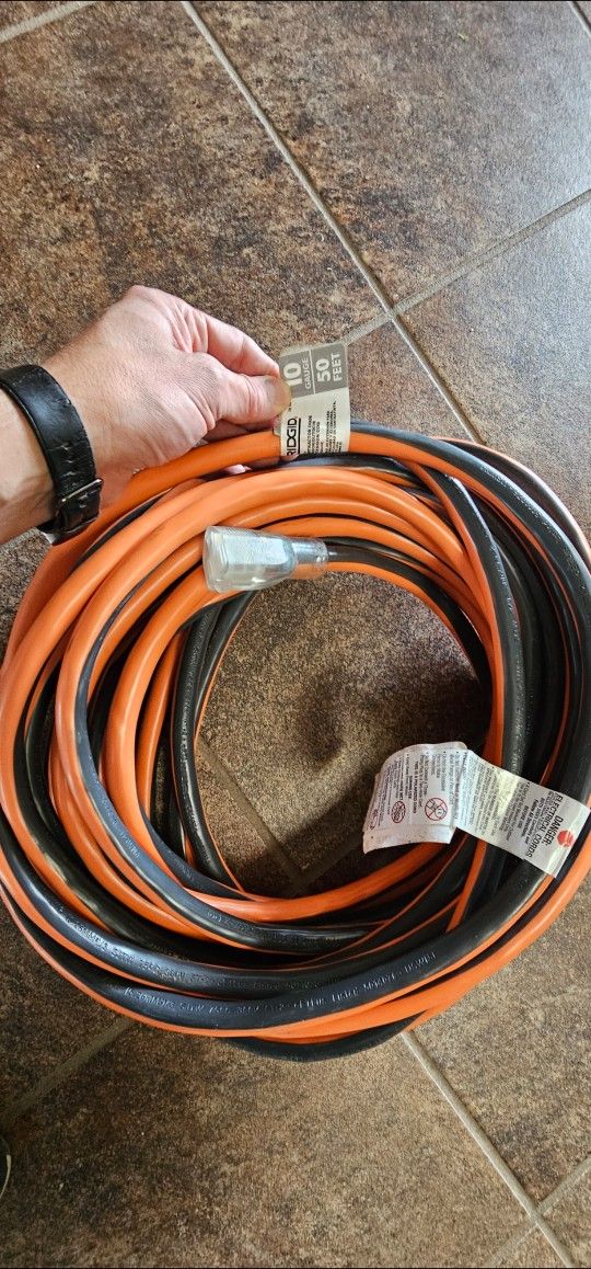 RIDGID
50 ft. 10/3 Heavy Duty Indoor/ Outdoor SJTW Extension Cord with Lighted End, Orange/Grey