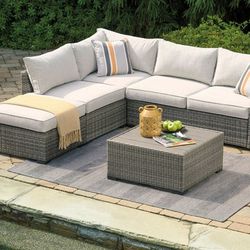 Cherry Point Gray 4pc Outdoor Sectional Set w/ Coffee Table"Enjoyable and Durable Outdoor Furniture: Discover Comfort with Gray Resin Wicker Sectiona

