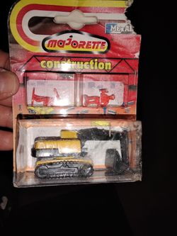 Vintage Mojortte  Construction vehicle with 2 red workers Still New in Original Box