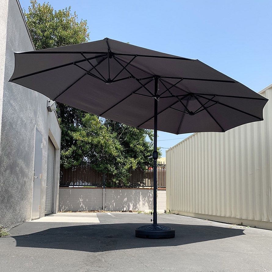 $115 (Brand New) Large 15ft double sided outdoor umbrella w/ 65 lbs plastic weight base (red/gray) 