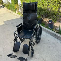 18 Inches Wide Wheelchair In Perfect Condition Easy To Fold It Reclines And Legs Extend 