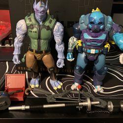 Package Of Action Figures And Weapons