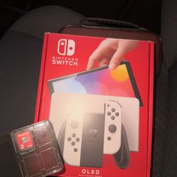 Nintendo Switch 2 OLED + Mario Odyssey & Zelda Case