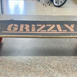 32-inch skateboard featuring Grizzly Griptape.