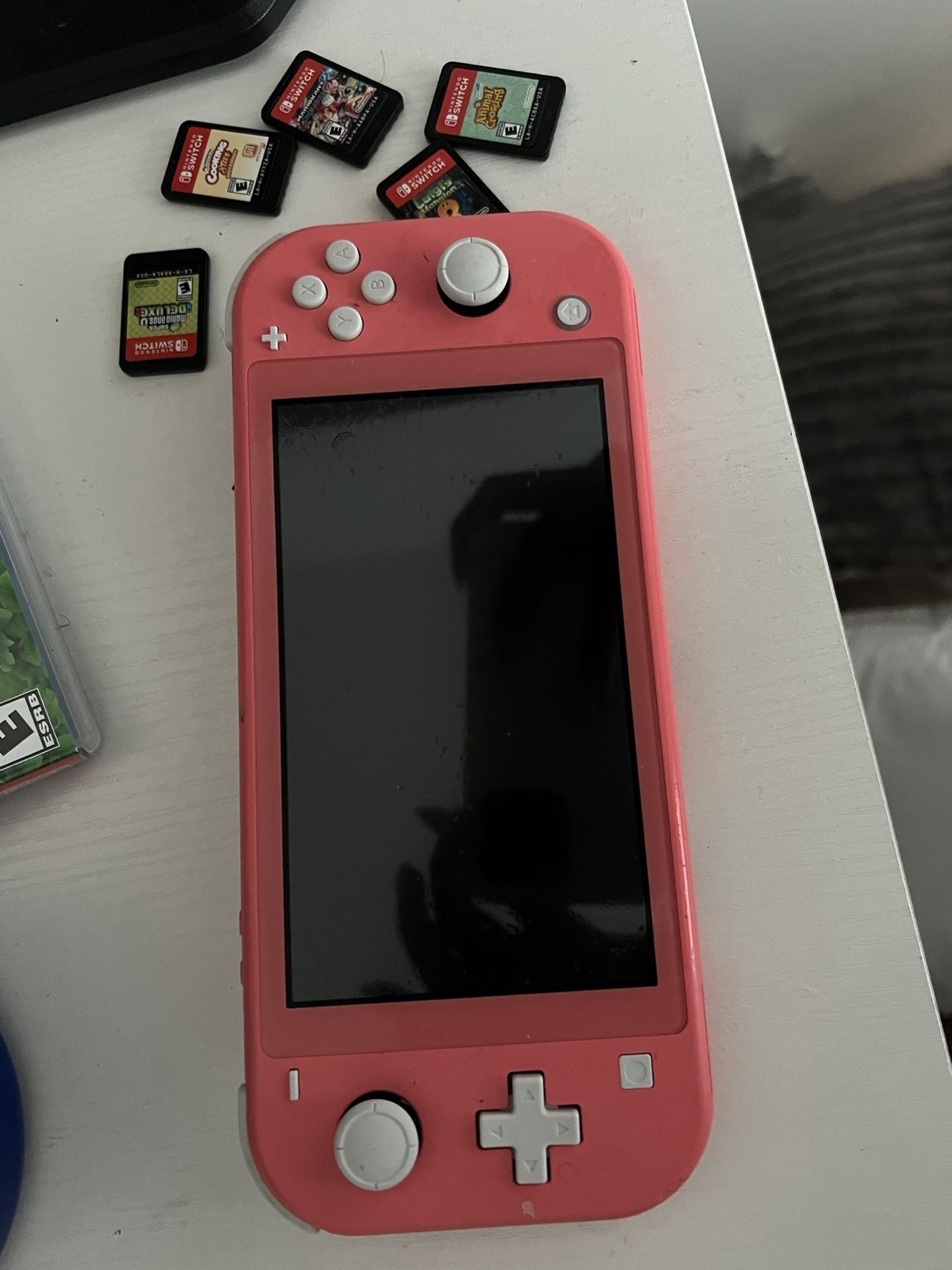 Pink Nintendo Switch + Games