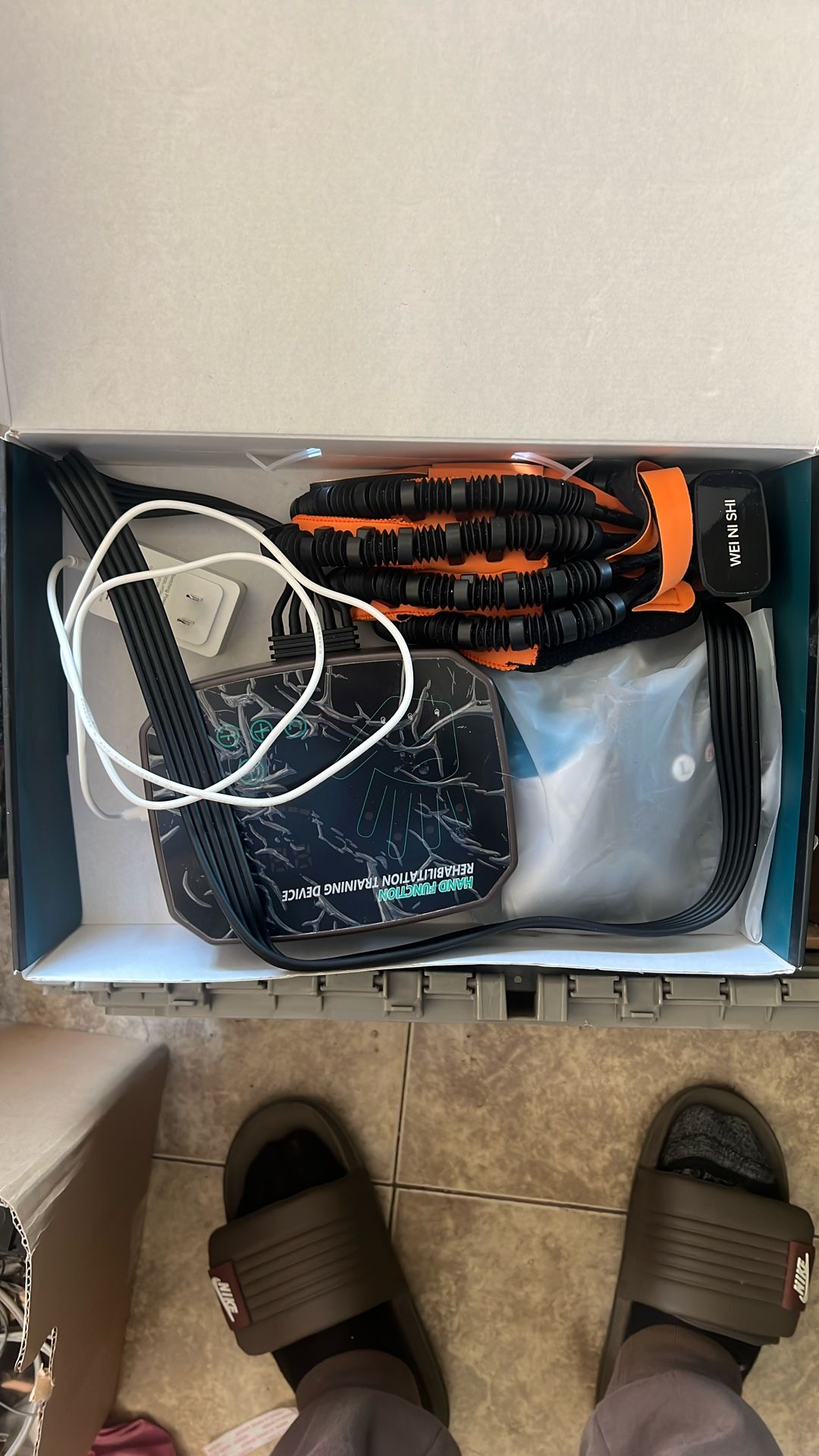 Rehabilitation Robotic Glove Training Device for Hand Dysfunction Patients