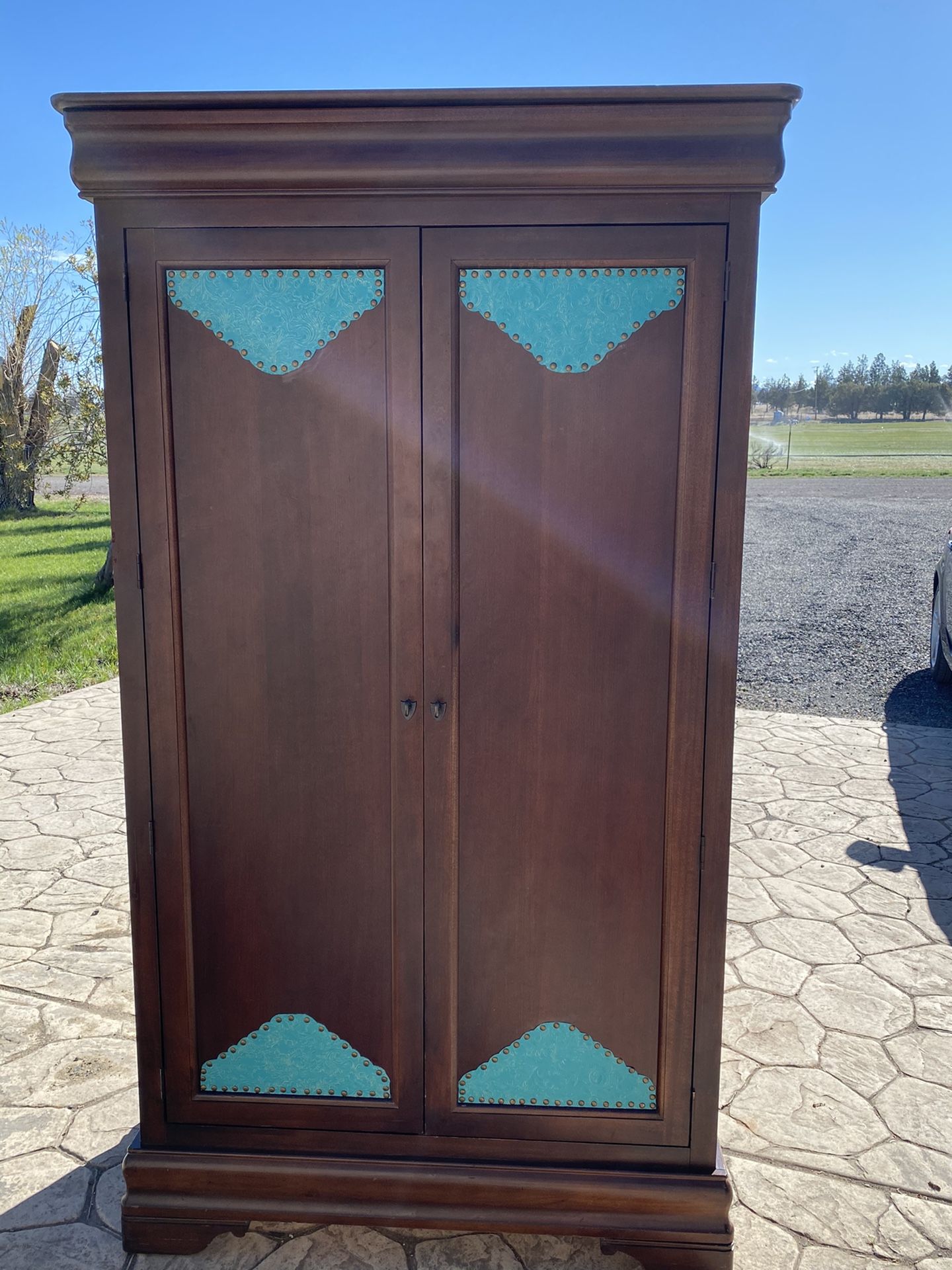 Western bedroom set refurbished with paisley leather