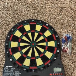 Electronic Dart Board with many darts.