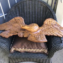 It’s an eagle out of wood from the 60s