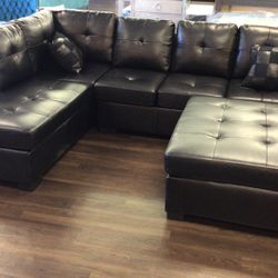 Brand New Leather Sectional.