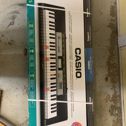 New In The Box Casio LK-135 Keyboard Piano With Stand