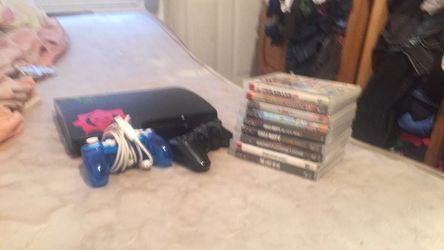 Ps3 with games and two remote