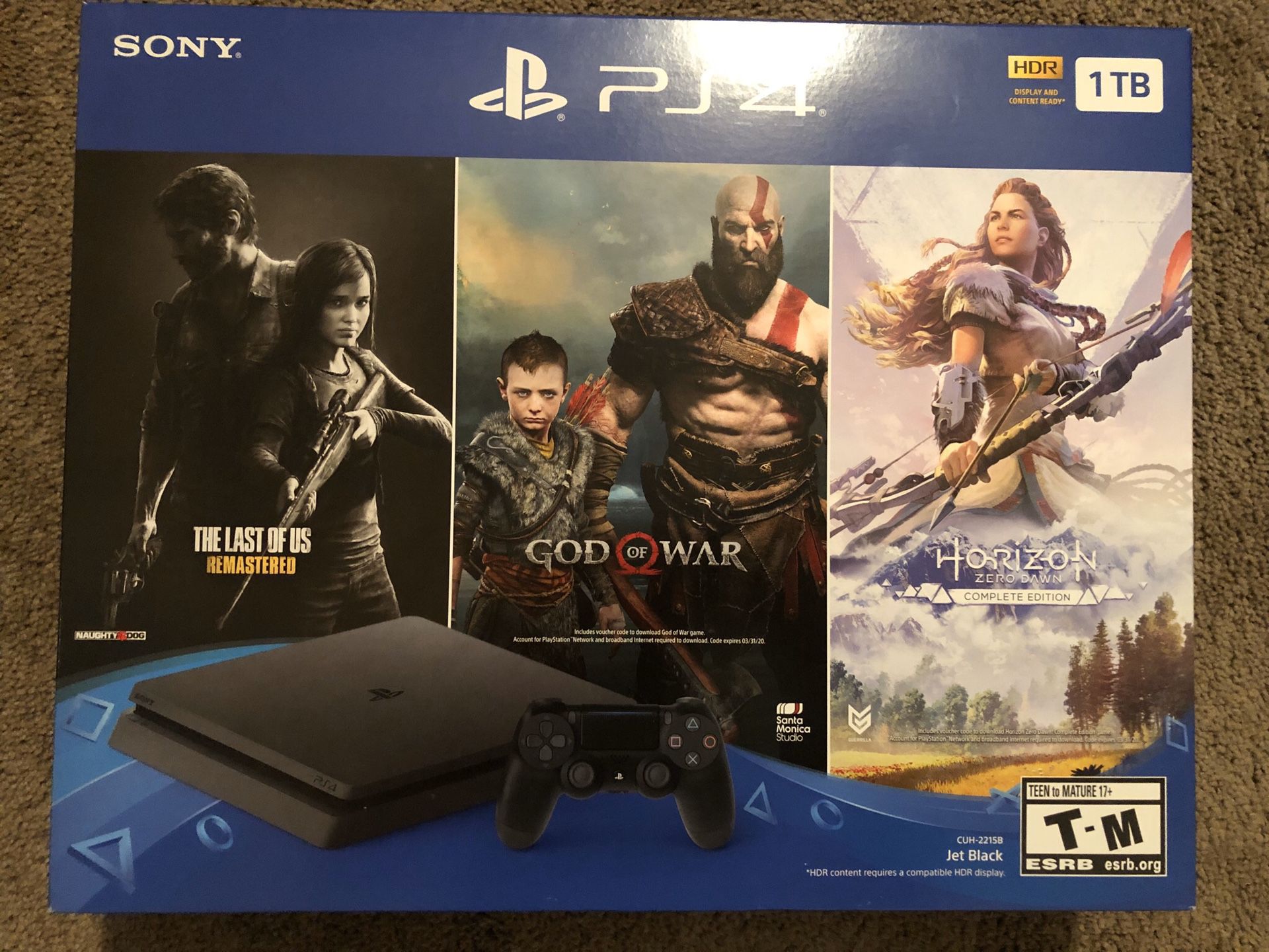 PS4 with three free games NEW IN BOX