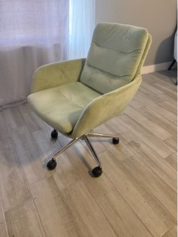 Small green desk chair